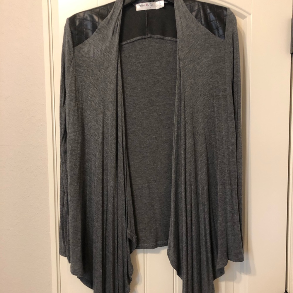 Gray sweater with black leather detail